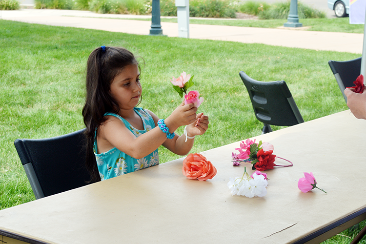 Flower girl at Arts Picnic 2023