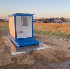 gray box with blue siding