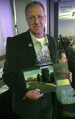 City of Greeley Asphalt Paving Inspector Randy Walrath shows off the “Best in Colorado” subdivision paving award the Greeley Public Works won for Keep Greeley Moving’s work last year in the Rolling Hills neighborhood. The Colorado Asphalt Paving Association (CAPA) recognized Greeley’s paving excellence at the 25th Annual “Best in Colorado” Asphalt Pavement Awards Program celebration last week in Denver. Additionally, the award recognized Greeley’s paving contractor for the work, Martin Marietta.